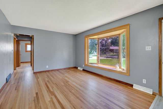 2704 Wedgewood Rd, Des Moines, IA 50317 - empty room featuring healthy amount of natural light and light wood-style floors