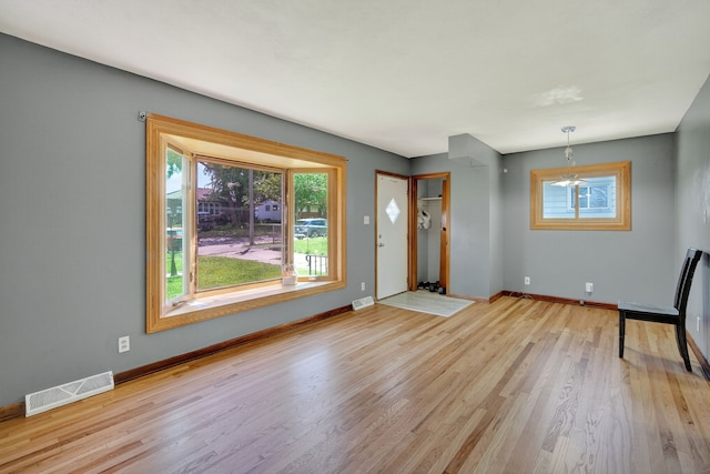 2704 Wedgewood Rd, Des Moines, IA 50317 - foyer featuring healthy amount of natural light and light wood-style floors