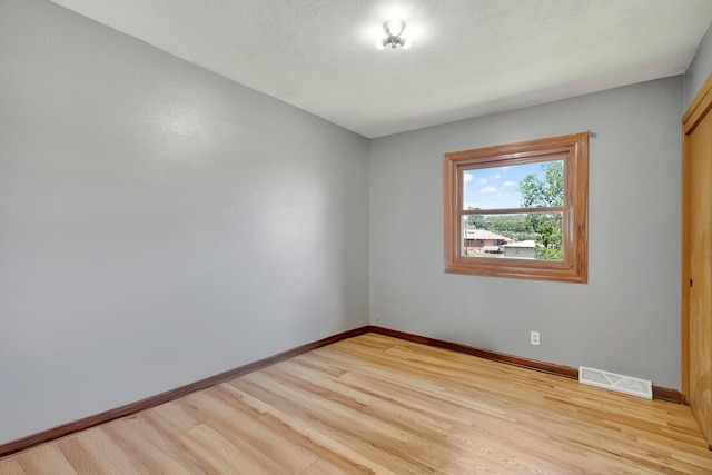 2704 Wedgewood Rd, Des Moines, IA 50317 - empty room with light wood-type flooring and baseboards