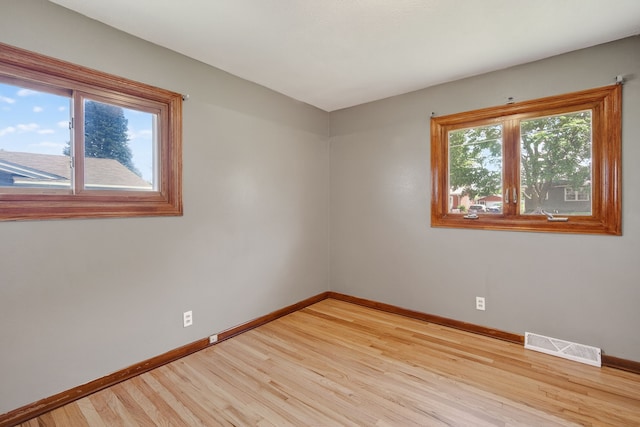 2704 Wedgewood Rd, Des Moines, IA 50317 - unfurnished room featuring light wood-type flooring