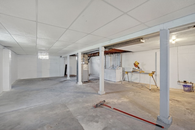 2704 Wedgewood Rd, Des Moines, IA 50317 - unfinished below grade area with independent washer and dryer and a paneled ceiling