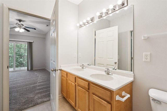 1313 SE University Ave Unit 206, Waukee, IA 50263 - bathroom with double vanity and a ceiling fan