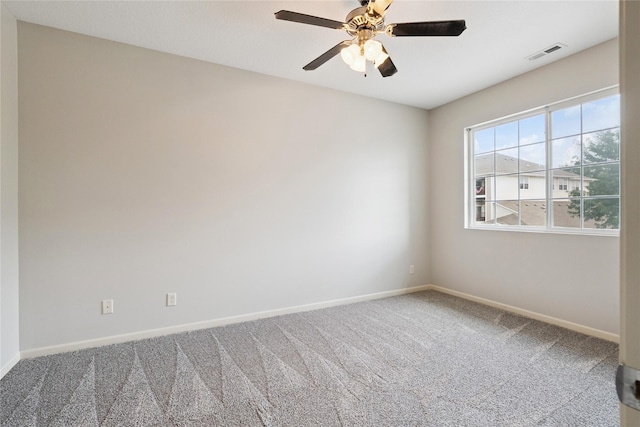 1313 SE University Ave Unit 206, Waukee, IA 50263 - carpeted empty room with baseboards and ceiling fan