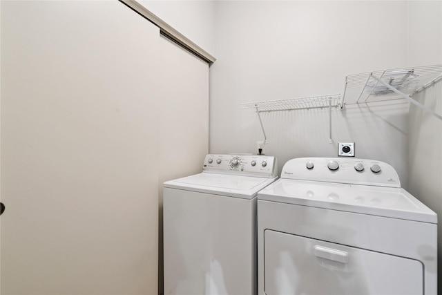 1313 SE University Ave Unit 206, Waukee, IA 50263 - washroom with washer and dryer