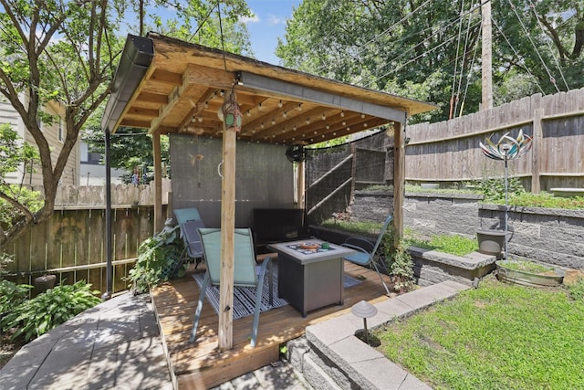 3923 Maquoketa Dr, Des Moines, IA 50311 - fenced backyard with an outdoor fire pit and a wooden deck