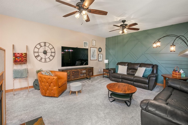 13001 Twana Dr, Urbandale, IA 50323 - carpeted living area featuring ceiling fan and an accent wall