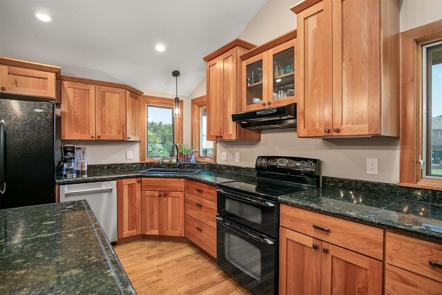 13001 Twana Dr, Urbandale, IA 50323 - kitchen featuring black appliances, under cabinet range hood, light wood-style floors, lofted ceiling, and dark stone counters