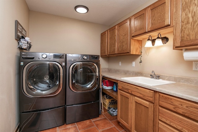 13001 Twana Dr, Urbandale, IA 50323 - laundry area featuring independent washer and dryer and cabinet space