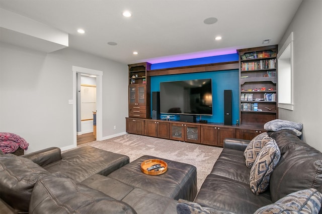 13001 Twana Dr, Urbandale, IA 50323 - carpeted living area with recessed lighting and baseboards