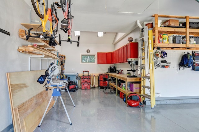 13001 Twana Dr, Urbandale, IA 50323 - garage with a workshop area