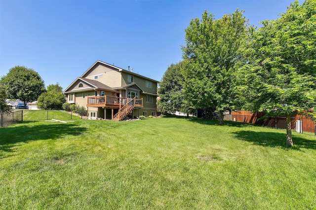 13001 Twana Dr, Urbandale, IA 50323 - rear view of property featuring stairway and a wooden deck