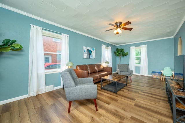 512 11th St, West Des Moines, IA 50265 - living room featuring crown molding, wood finished floors, and ceiling fan