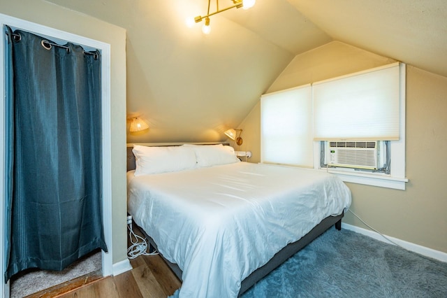 512 11th St, West Des Moines, IA 50265 - bedroom with lofted ceiling and cooling unit