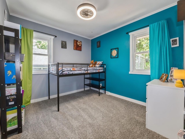 2300 Locust St, West Des Moines, IA 50265 - carpeted bedroom featuring crown molding and baseboards