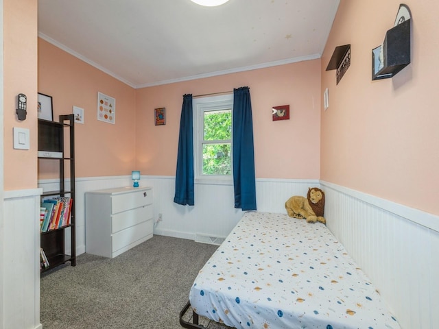 2300 Locust St, West Des Moines, IA 50265 - carpeted bedroom featuring a wainscoted wall and crown molding