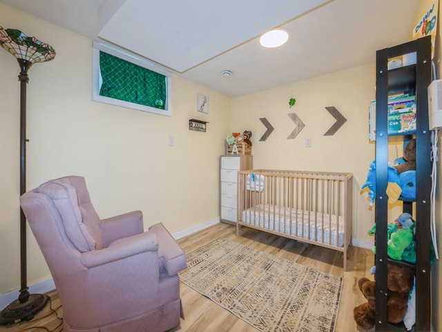 2300 Locust St, West Des Moines, IA 50265 - bedroom featuring wood finished floors