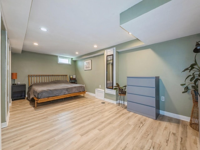 2300 Locust St, West Des Moines, IA 50265 - bedroom with wood finished floors and recessed lighting