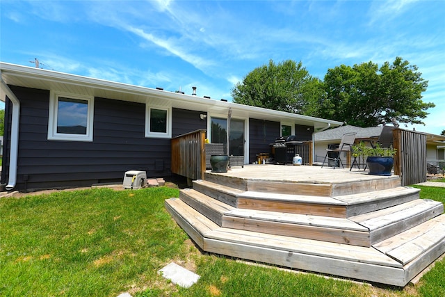 3600 Brinkwood Rd, Des Moines, IA 50310 - rear view of property featuring a deck and a yard