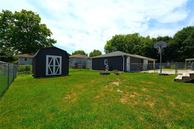 3600 Brinkwood Rd, Des Moines, IA 50310 - fenced backyard with a detached garage and a storage shed