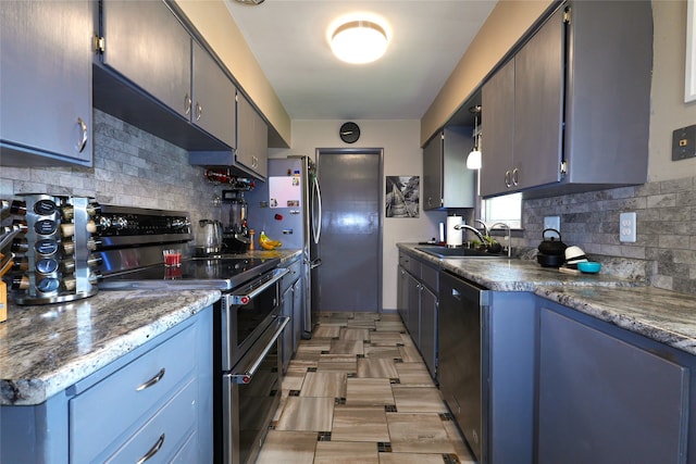 3600 Brinkwood Rd, Des Moines, IA 50310 - kitchen with stainless steel appliances and tasteful backsplash