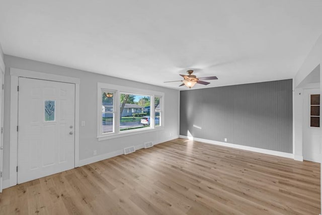 1515 Chance Ct, Adel, IA 50003 - entryway with a ceiling fan and wood finished floors