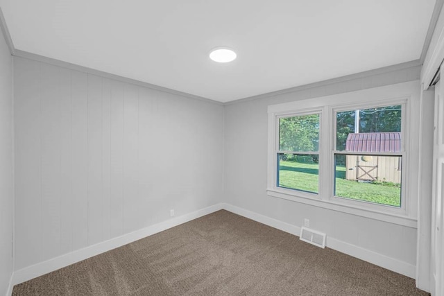 1515 Chance Ct, Adel, IA 50003 - unfurnished room with dark colored carpet and ornamental molding