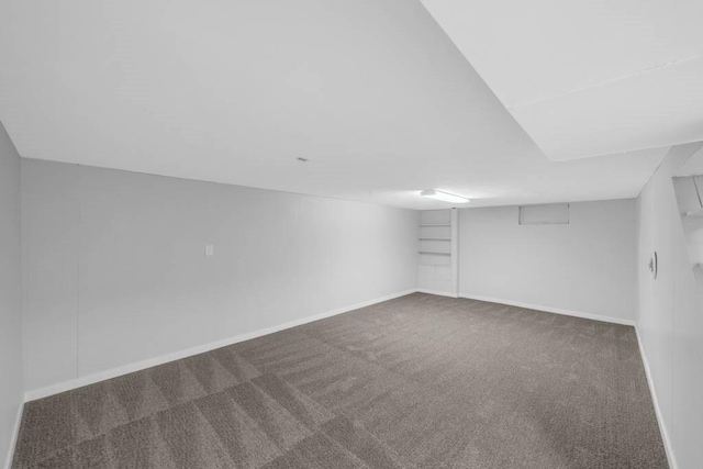 1515 Chance Ct, Adel, IA 50003 - finished below grade area featuring carpet and baseboards