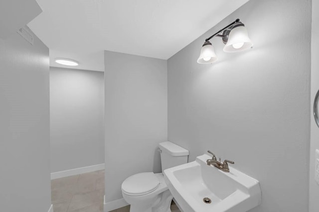 1515 Chance Ct, Adel, IA 50003 - half bathroom with toilet and tile patterned floors