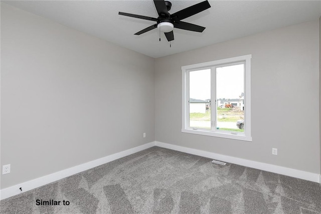 790 Hamilton Rd, Waukee, IA 50263 - carpeted spare room with baseboards and a ceiling fan