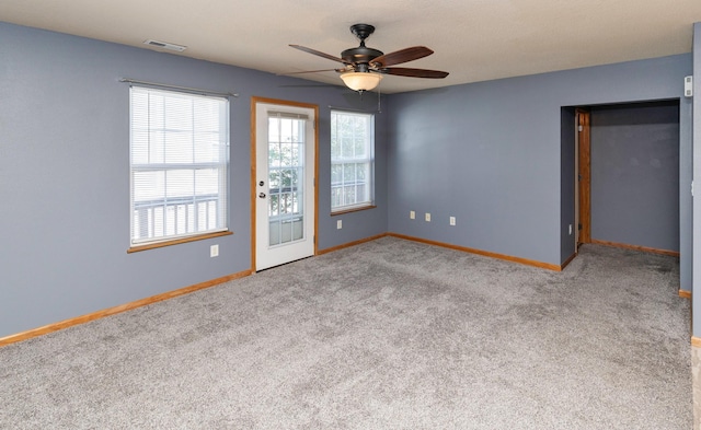 1115 Fieldstone Ln, Pleasant Hill, IA 50327 - unfurnished bedroom with carpet flooring and ceiling fan