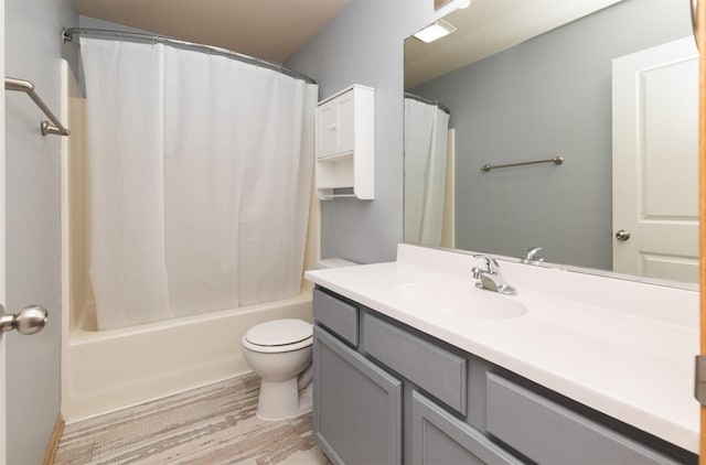 1115 Fieldstone Ln, Pleasant Hill, IA 50327 - bathroom with vanity, wood finished floors, and shower / tub combo with curtain