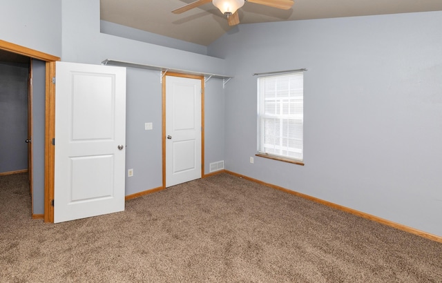 1115 Fieldstone Ln, Pleasant Hill, IA 50327 - unfurnished bedroom with carpet, lofted ceiling, and ceiling fan