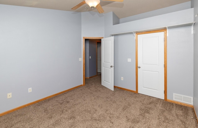 1115 Fieldstone Ln, Pleasant Hill, IA 50327 - unfurnished bedroom featuring carpet flooring and ceiling fan