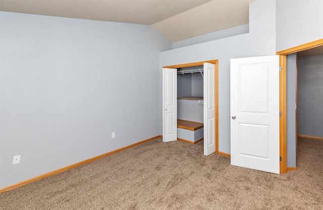 1115 Fieldstone Ln, Pleasant Hill, IA 50327 - unfurnished bedroom with carpet flooring, lofted ceiling, and a closet