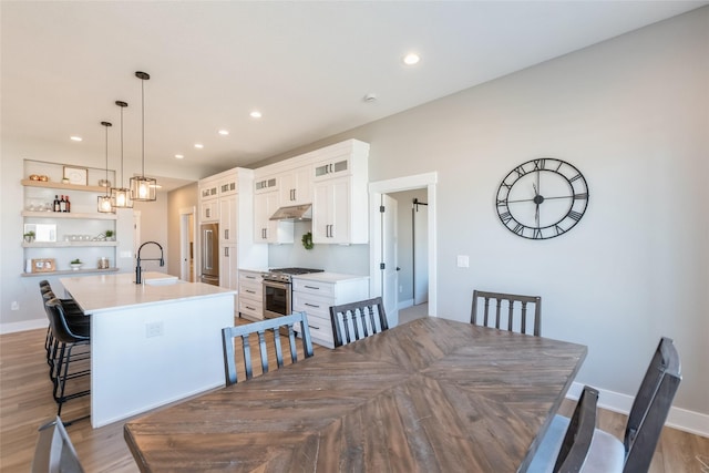 17965 Hammontree Cir, Clive, IA 50325 - dining space featuring recessed lighting and wood finished floors