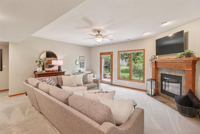 3607 152nd St, Urbandale, IA 50323 - living room featuring light carpet, a high end fireplace, and ceiling fan