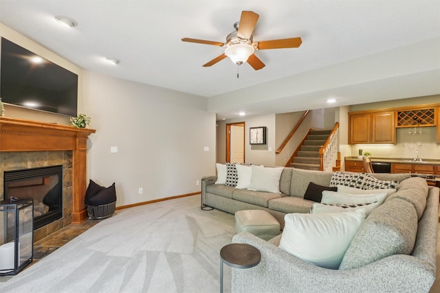 3607 152nd St, Urbandale, IA 50323 - living area featuring light colored carpet, wet bar, stairway, ceiling fan, and recessed lighting