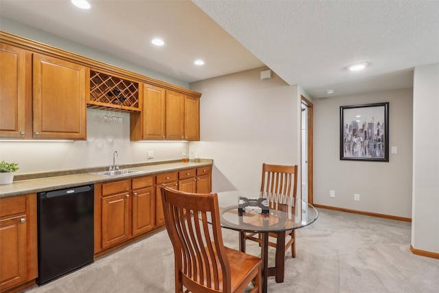3607 152nd St, Urbandale, IA 50323 - kitchen with dishwasher, light carpet, recessed lighting, brown cabinetry, and light countertops