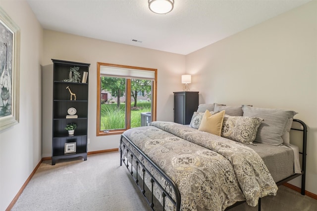 3607 152nd St, Urbandale, IA 50323 - carpeted bedroom featuring baseboards