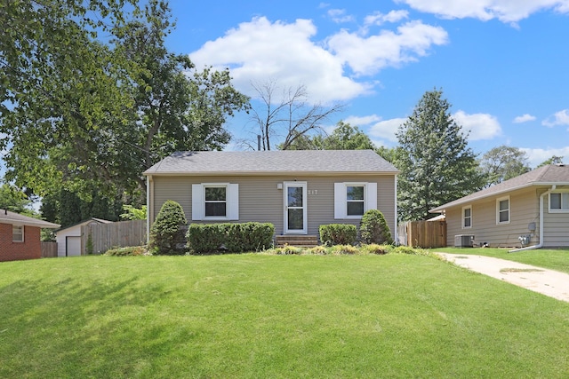217 E Park Ave, Des Moines, IA 50315 - bungalow-style home featuring a storage shed and entry steps