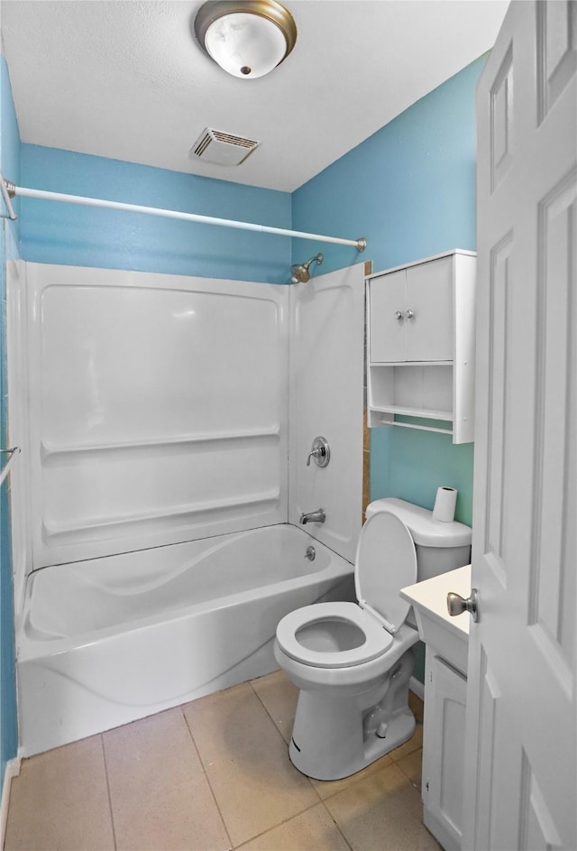 217 E Park Ave, Des Moines, IA 50315 - bathroom with shower / bathtub combination, tile patterned floors, vanity, and a textured ceiling