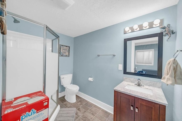 1965 SE Waddell Way, Waukee, IA 50263 - bathroom featuring vanity, a stall shower, and a textured ceiling