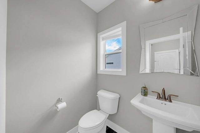1965 SE Waddell Way, Waukee, IA 50263 - half bath featuring a sink and toilet