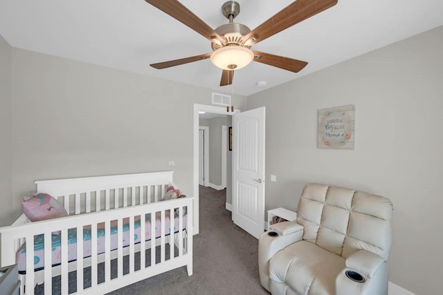 1965 SE Waddell Way, Waukee, IA 50263 - carpeted bedroom with baseboards and ceiling fan