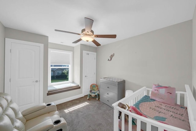 1965 SE Waddell Way, Waukee, IA 50263 - carpeted bedroom featuring ceiling fan and baseboards