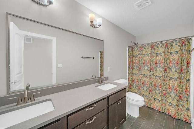 1965 SE Waddell Way, Waukee, IA 50263 - bathroom with double vanity and a shower with shower curtain