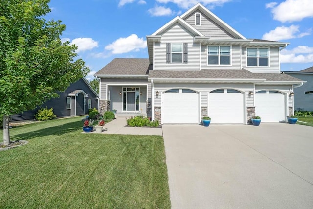 1965 SE Waddell Way, Waukee, IA 50263 - craftsman-style house with a garage, a front yard, driveway, stone siding, and a shingled roof