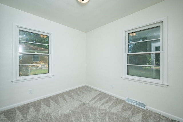 1205 Elder Ln, Des Moines, IA 50315 - empty room with carpet flooring and baseboards