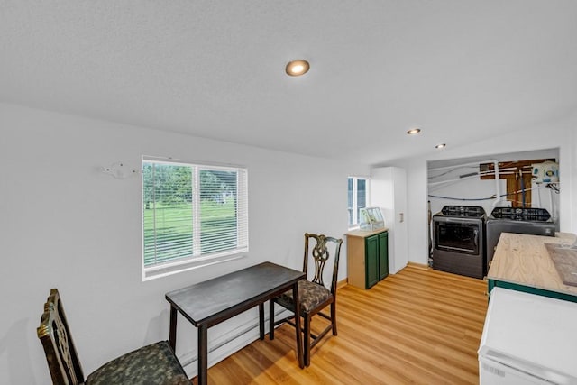 1020 SW 3rd St, Nevada, IA 50201 - dining area with light wood-style floors and recessed lighting