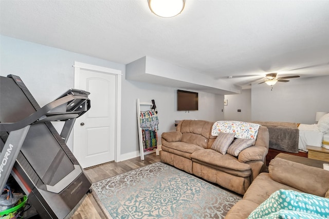 3504 Hawthorn Dr SW, Bondurant, IA 50035 - living area with wood finished floors and a ceiling fan